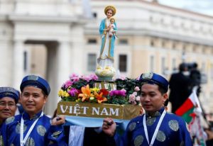 Pilgrims from Vietnam hold a statue of Our Lady during a Marian vigil prayer led by Pope Francis in Saint Peter's square at the Vatican, October 8, 2016. Catholicism is allowed in Vietnam, though the church is heavily infiltrated by communists. Protestants are very closely monitored, especially if in churches belonging to ethnic minority tribes. (Reuters)